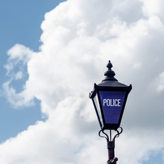 Fototapeta na wymiar Police sign street light old fashioned uk Stratford Upon Avon