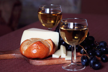White wine, cheese and grapes..
