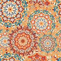 Seamless pattern with symmetrical mandalas. Ethnic texture