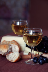 White wine, cheese and grapes..