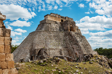 Fototapeta na wymiar view from nunnery to Pyramid of the Magician in ancient mayan uxmal ruins, mexico