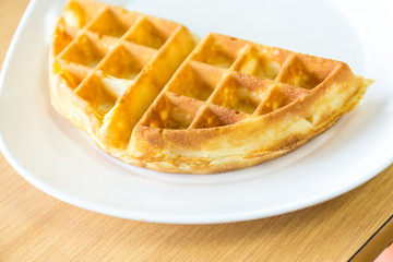 homemade waffle in white dish