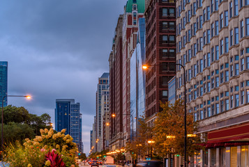 Naklejka premium Michigan Avenue in Chicago. Image of busy traffic at Chicago night street.