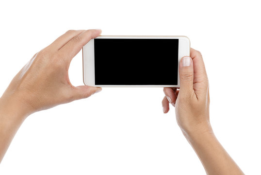 Female hand taking photo with smart phone isolated on white background.   