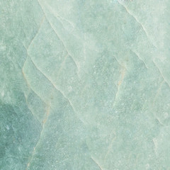 Closeup surface marble pattern at green marble stone wall textured background