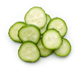 Cucumber slices isolated on white, from above