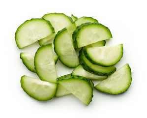 Cucumber slices isolated on white, from above