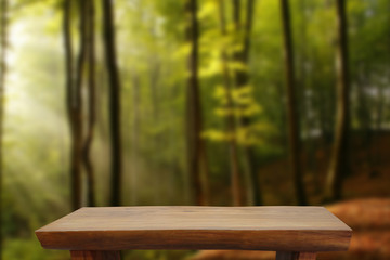 Naklejka premium Wooden table top on blurred background