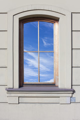  window with sky is reflected
