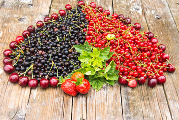 Healthy fruits for  strong heart on wooden table in the rain