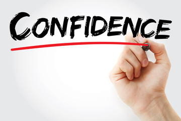 Hand writing Confidence with marker, concept background