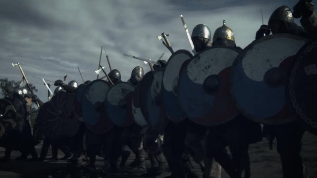 Shot of Advancing Army of Viking Warriors. Medieval Reenactment. Shot on RED Cinema Camera in 4K (UHD).