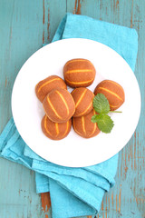 banana chocolate cookies decorated with mint on a plate