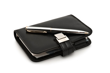 Organizer and pen. Isolated on white background