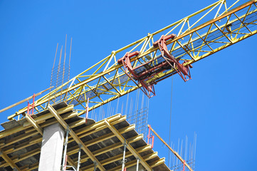 Crane and highrise construction site