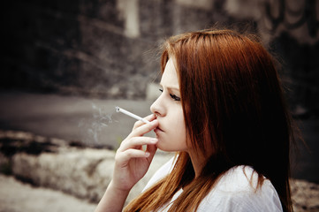 Smoking beautiful young girl