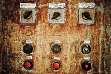 Closeup of old rusty control panel