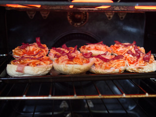 Pizza Buns Under An Oven Grill