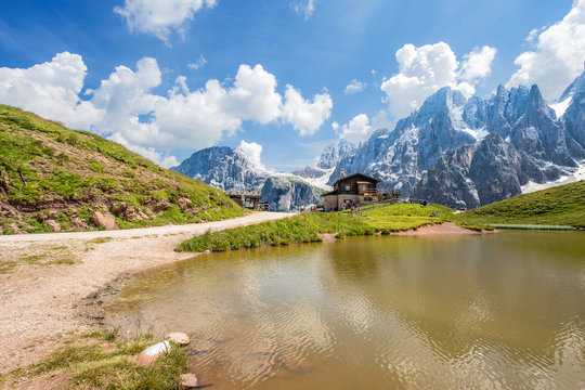 Dolomites Alps in Italy, Pale di San Martino mountains and Baita Segantini with the lake / landscape © faber121
