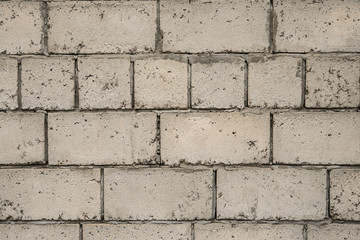 Серая каменная стена. Белые кирпичи текстура