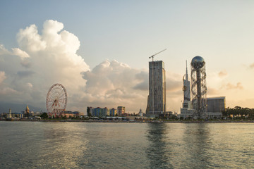 Obraz premium Batumi city in the sunset. View from the sea.