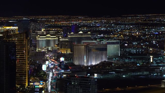 Las Vegas shot at night, city and the strip subtly flickering, no logos or signs