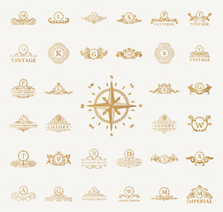 Luxury vintage logos set. Calligraphic emblems and elements