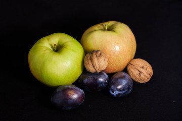 apple and plum and walnuts