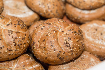wholemeal bread baguettes in a basket to shop in a supermarket