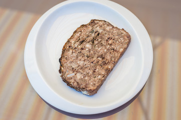rabbit pate in white plate