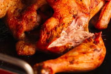 Baked chicken with fresh browned crust closeup