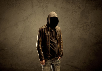 Fototapeta na wymiar Undercover hooded stranger in the dark