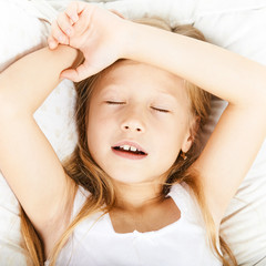 Portrait of a beautiful little girl sleeping