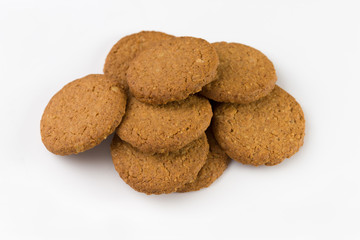 Pile of biscuits isolated on white background.