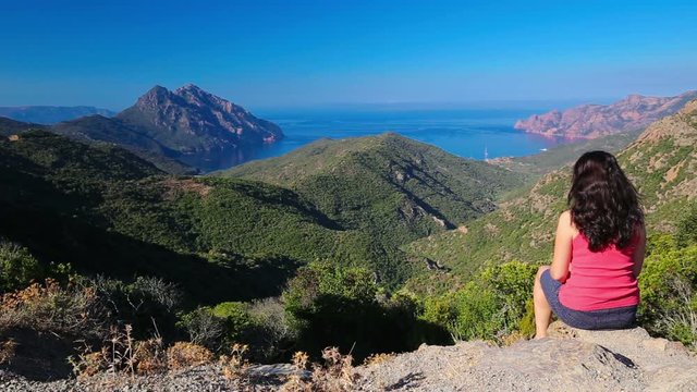 View from famous D81 coastal road with view of Golfe de Girolata from Bocca Di Palmarella, Corsica, France, Europe