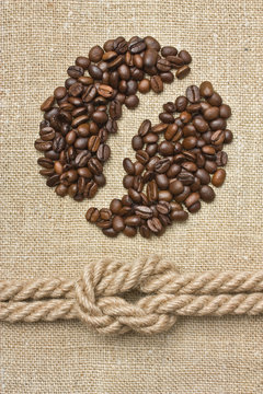 coffee beans and rope knot on sack
