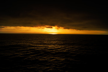 Fototapeta na wymiar Sunset on the water