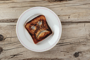 Sad toast on an old wooden