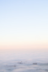 Fog covers the Vale of Gloucester at dusk