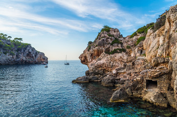 Fototapeta premium Beautiful sunset at the Cala Deia on Mallorca, Baleares, Spain