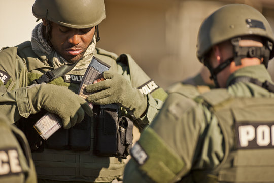 Two police officers at a training facility.