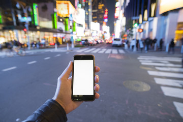 man holding a phone in Manhattan New York City