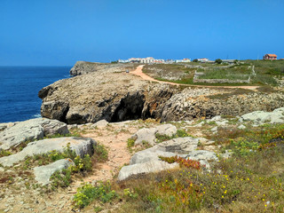 Ocean cliffs near Cabo Carvoeiro in daylight, Peniche