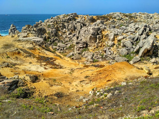 Ocean cliffs near Cabo Carvoeiro in daylight, Peniche, Portugal