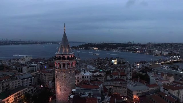 The New Istanbul Skyline and Galata Tower Aerial View in 4K with Topkapi Palace, Hagia Sophia, Blue Mosque and Goldenhorn feat Bosphorus in the Background, Dusk Sunset Time UHD