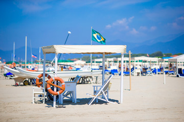 Lifesaver hut at Forte dei Marmi beach in Italy on a summer day