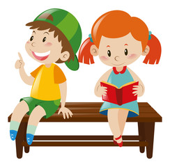 Boy and girl on bench