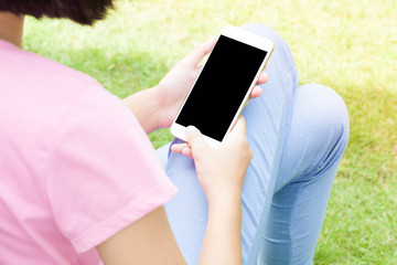 Close up of hands using modern smart phone, sunny day, sunlight,