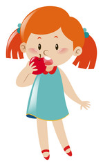 Girl in blue dress eating apple