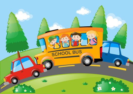 Road scene with children riding on school bus.